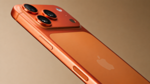 Close-up of an iPhone 18 Pro Max with a sleek orange finish, showcasing the triple-camera setup and Apple logo.