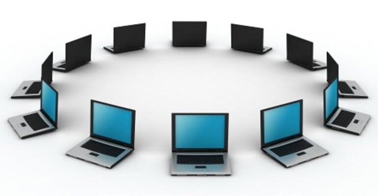 Circle of laptops representing the Best Laptops for Writers, arranged for collaboration and connectivity.
